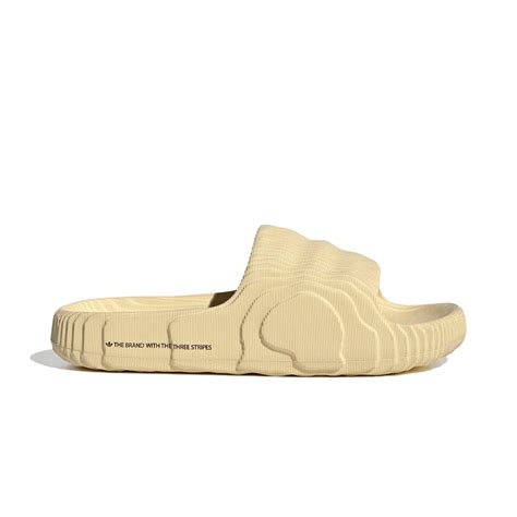 The perfect slides for summer: Adidas adilette 22 in magic lime and desert sand